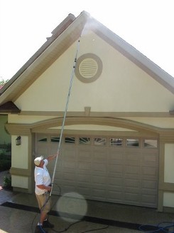 Powerwashing residential exterior