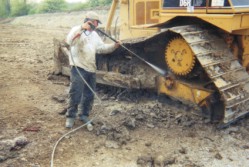 Powerwashing heavy equipment